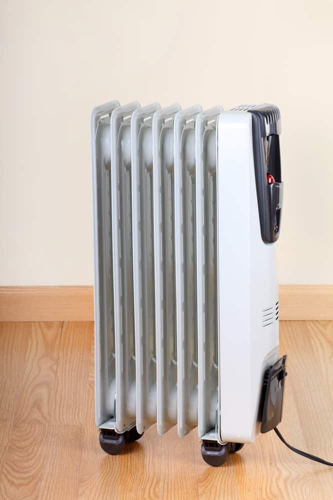 Radiant heater on hardwood floor.